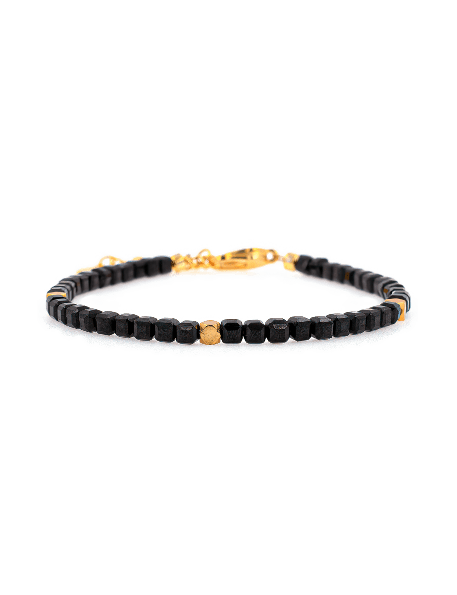 Black Tourmaline faceted bracelet with silver spacer beads for protection and emotional stability.