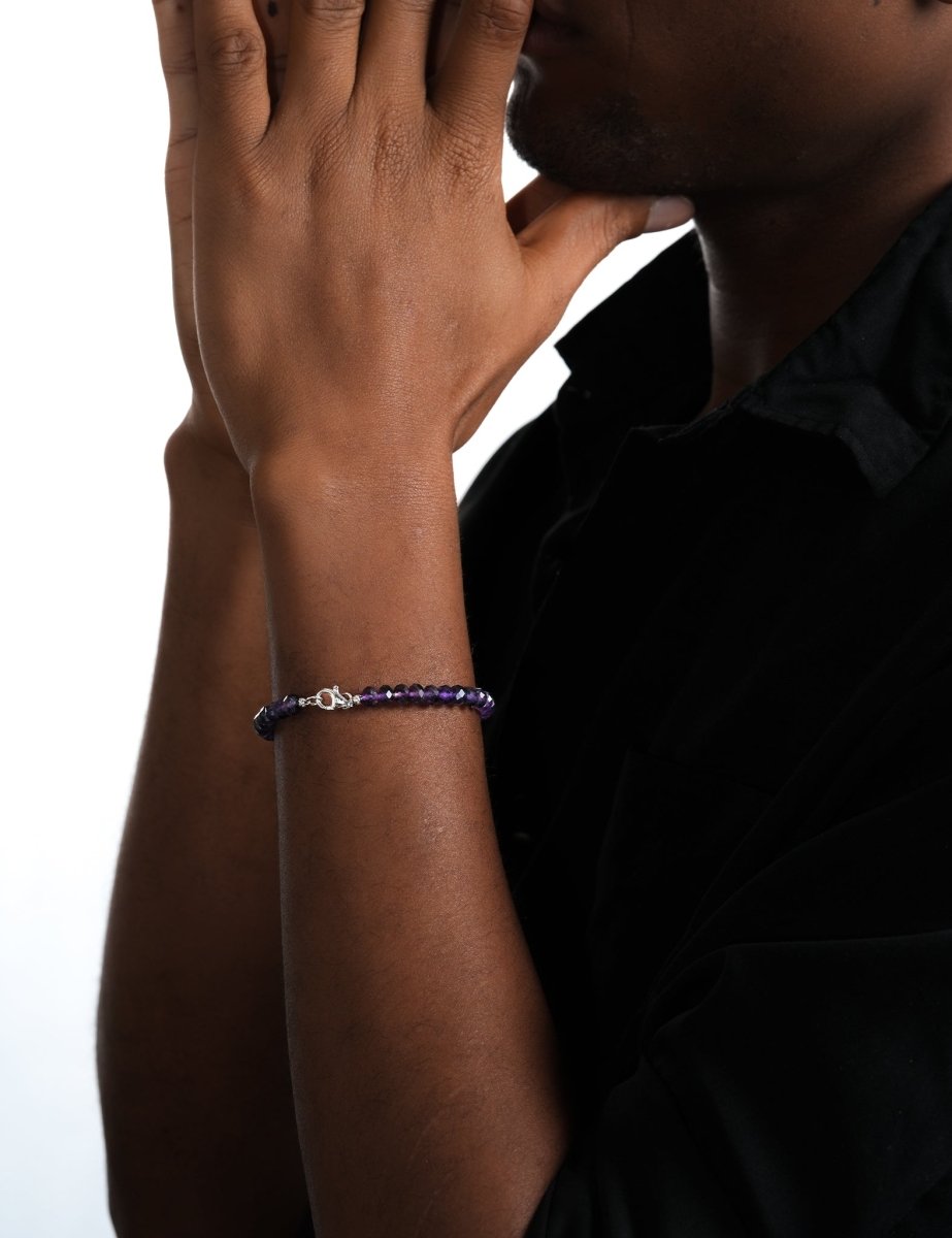 Model wearing BEAMMORE amethyst faceted 4×6mm bracelet – Clean, modern style