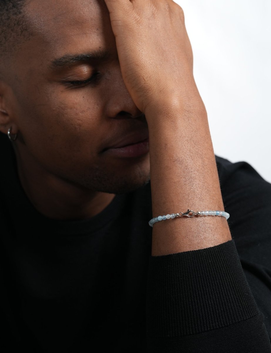 Model wearing BEAMMORE aquamarine faceted 4mm bracelet – Clean, modern style