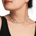 Model wearing AURA DUO Aquamarine Star Pearl Necklace featuring aquamarine beads and star-shaped pearls.