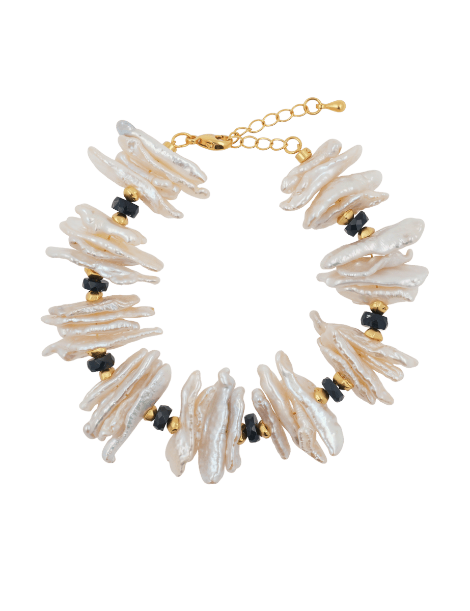 AURA DUO Black Opal Biwa-Style Stick Pearl Bracelet with gold spacer beads and chain closure.