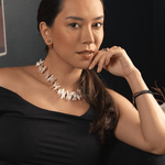 Elegant woman wearing AURA DUO black opal Biwa-style stick pearl necklace with spacer beads.