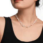 Model showcasing the AURA DUO Clear Quartz Pearl Necklace, highlighting its crystal elegance and minimalist design.