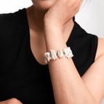Model wearing a Biwa-style stick pearl bracelet with green agate and gold-plated sterling silver beads.