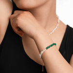 AURA DUO Green Agate Pearl Bracelet showcased on a model's wrist, featuring agate and pearl beads.