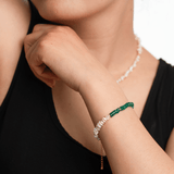 AURA DUO Green Agate Pearl Bracelet showcased on a model's wrist, featuring agate and pearl beads.