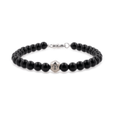 Black onyx bracelet with sterling silver zodiac spacer beads, 6mm handcrafted for men, offering protection and strength.
