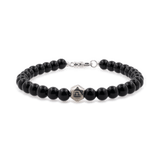 Black onyx bracelet for men with 6mm beads and sterling silver zodiac spacer beads, designed for protection and strength.