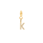 Gold zircon letter charm 'K' featuring a sparkling design, perfect for personal expression and individuality.