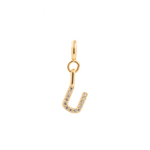 Gold zircon letter charm 'U' featuring a sleek design and sparkling stones for personal expression.