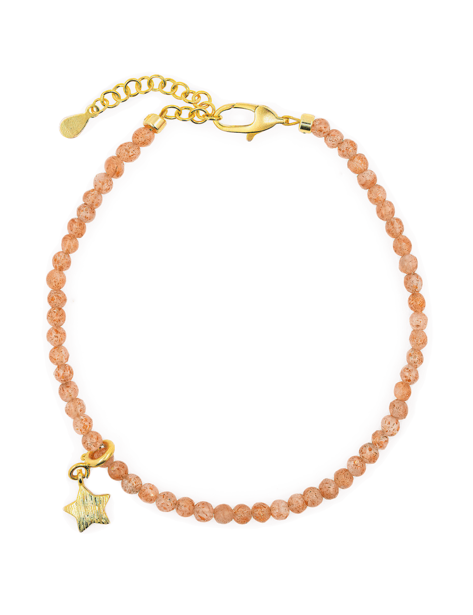 Dainty Sunstone bracelet with star charm and sterling silver clasp, representing joy and personal power.