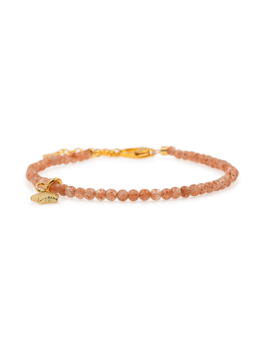 Blessing Sunstone dainty bracelet with star charm in 3mm beads showcasing warmth and vitality.