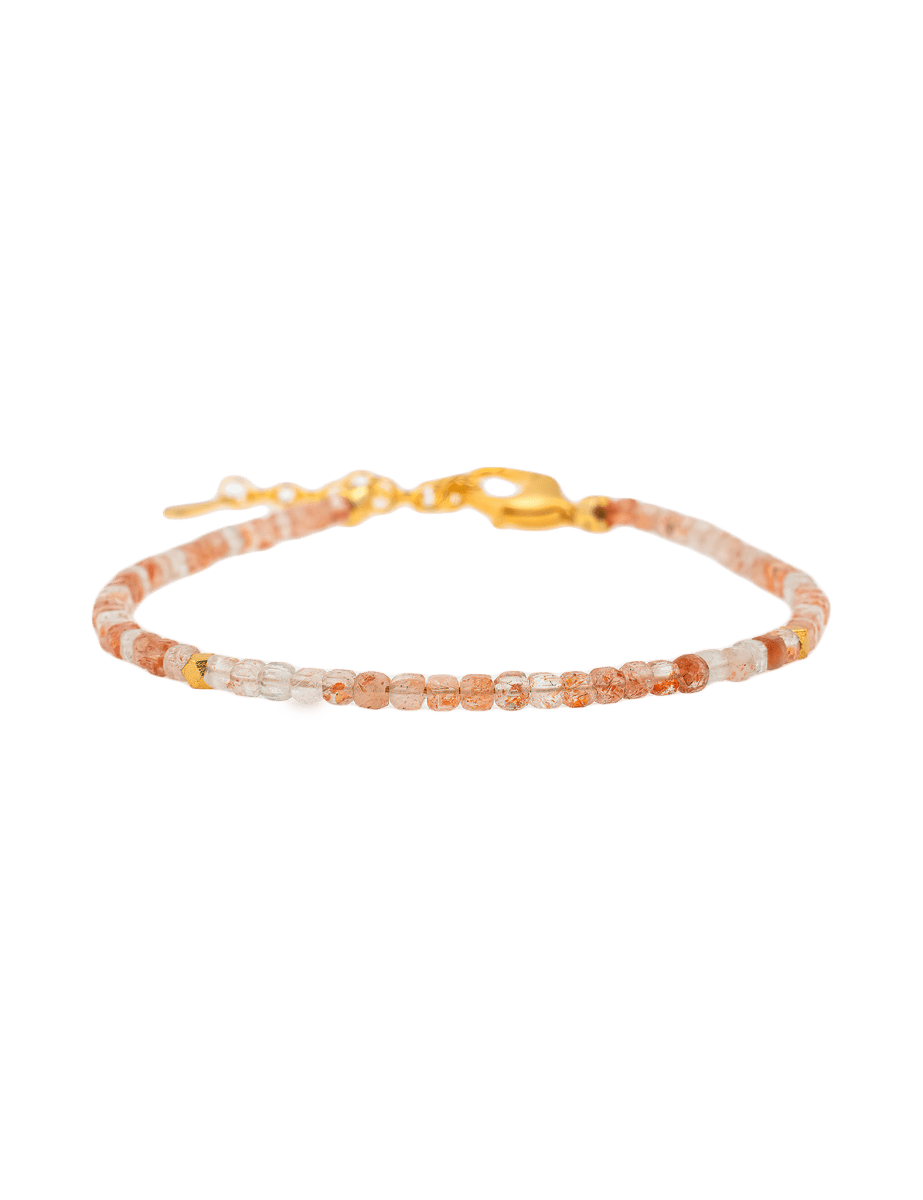 Blessing Sunstone faceted dainty bracelet with silver spacer beads, symbolizing joy and personal power.