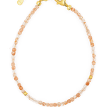 Dainty Sunstone bracelet with silver spacer beads, featuring a gold clasp and adjustable chain for a perfect fit.