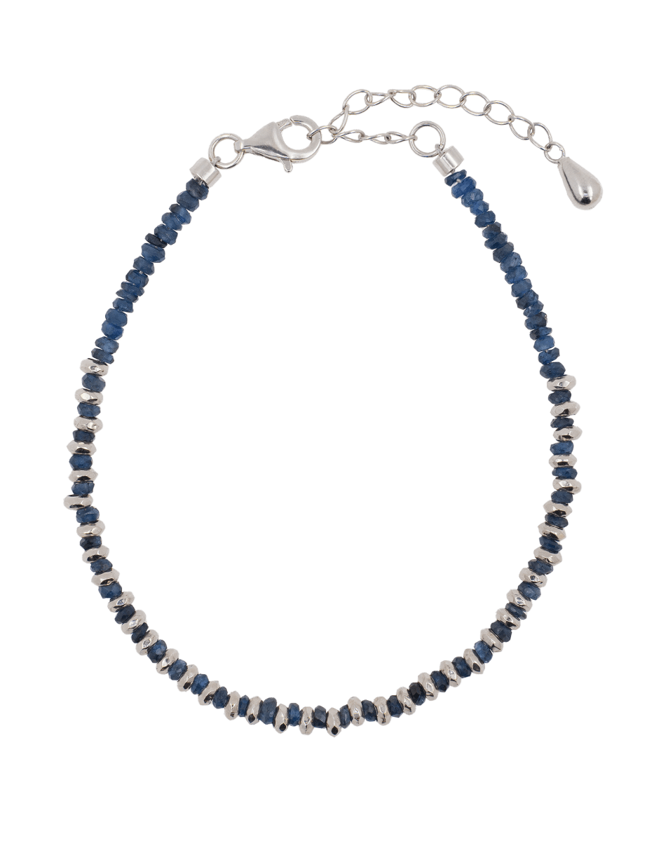 Calm blue sapphire beaded bracelet with sterling silver spacers and clasp for elegant stacking or solo wear.