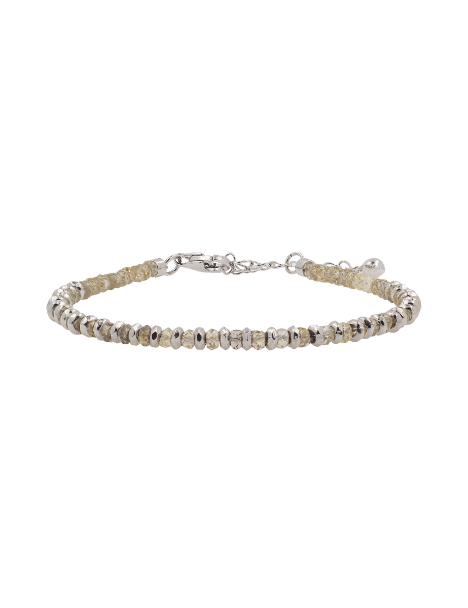 Confidence yellow sapphire beaded bracelet with sterling silver spacer beads, symbolizing optimism and elegance.