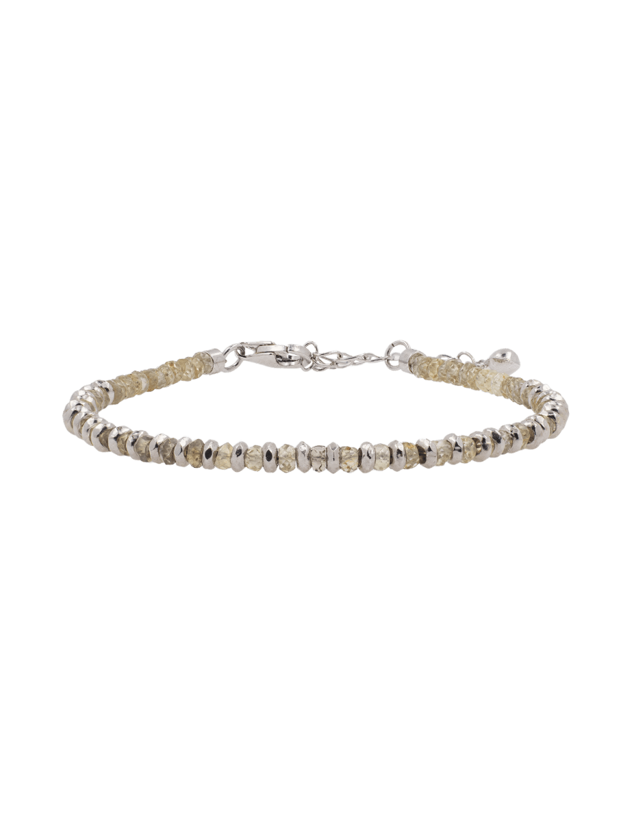 Confidence yellow sapphire beaded bracelet with sterling silver spacer beads, symbolizing optimism and elegance.