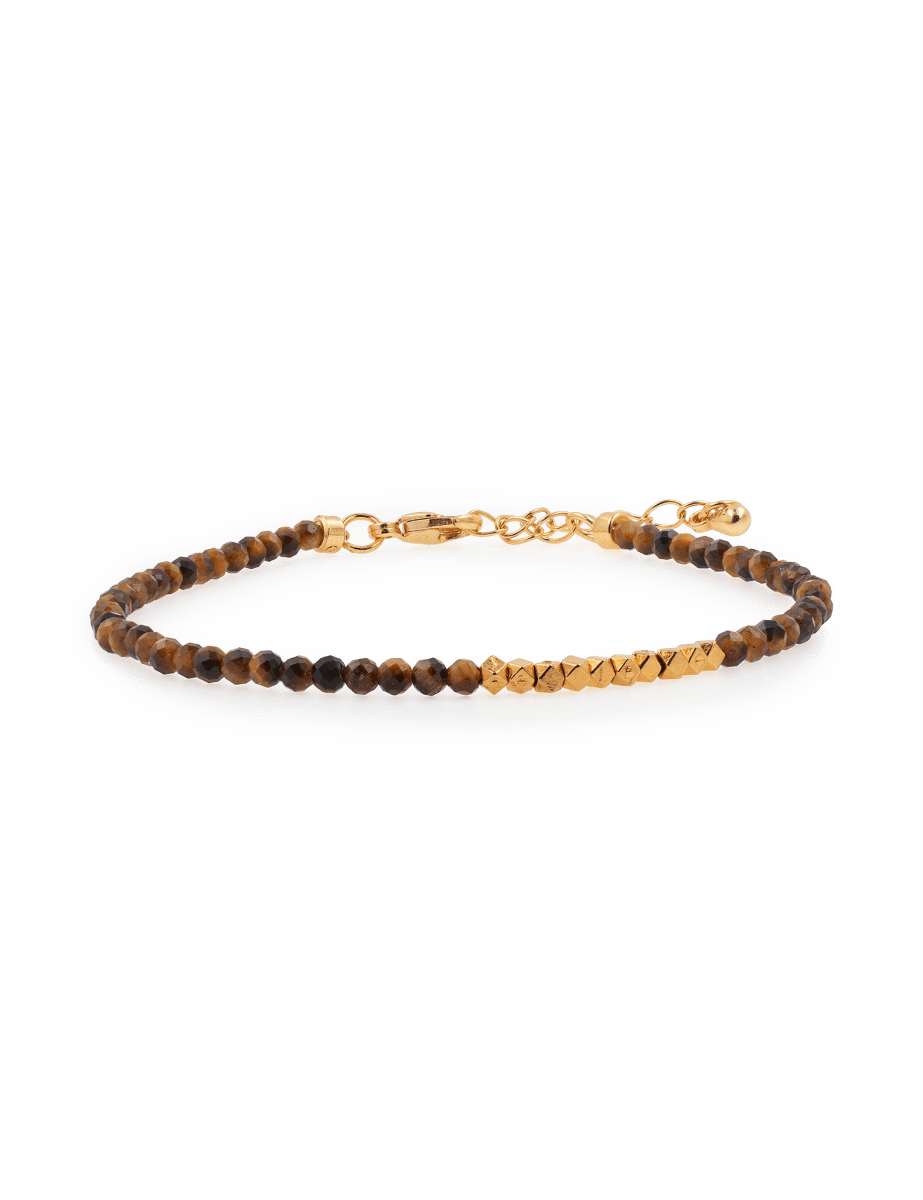 Yellow Tiger’s Eye bracelet with silver spacer beads, promoting stability and inner strength.