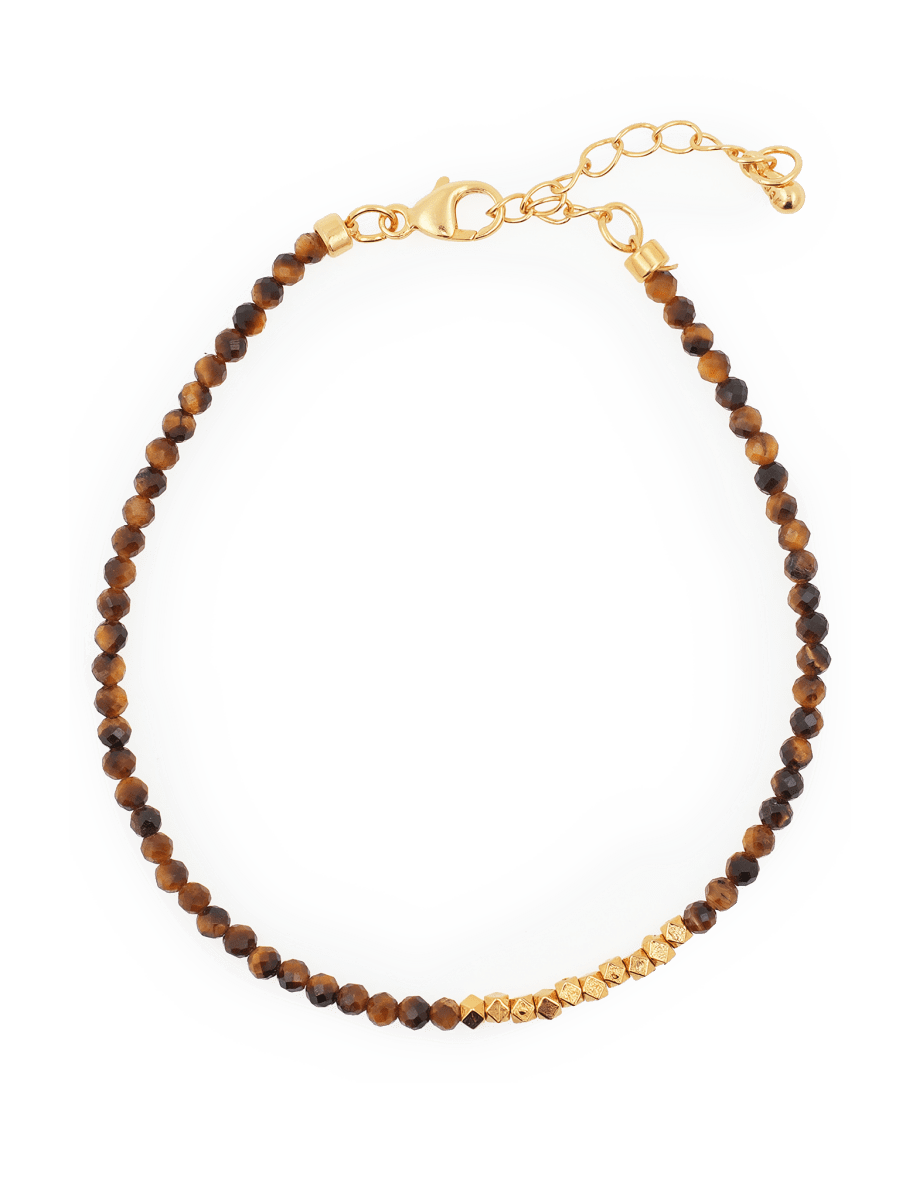 Yellow Tiger’s Eye bracelet with gold spacer beads, symbolizing confidence and stability.