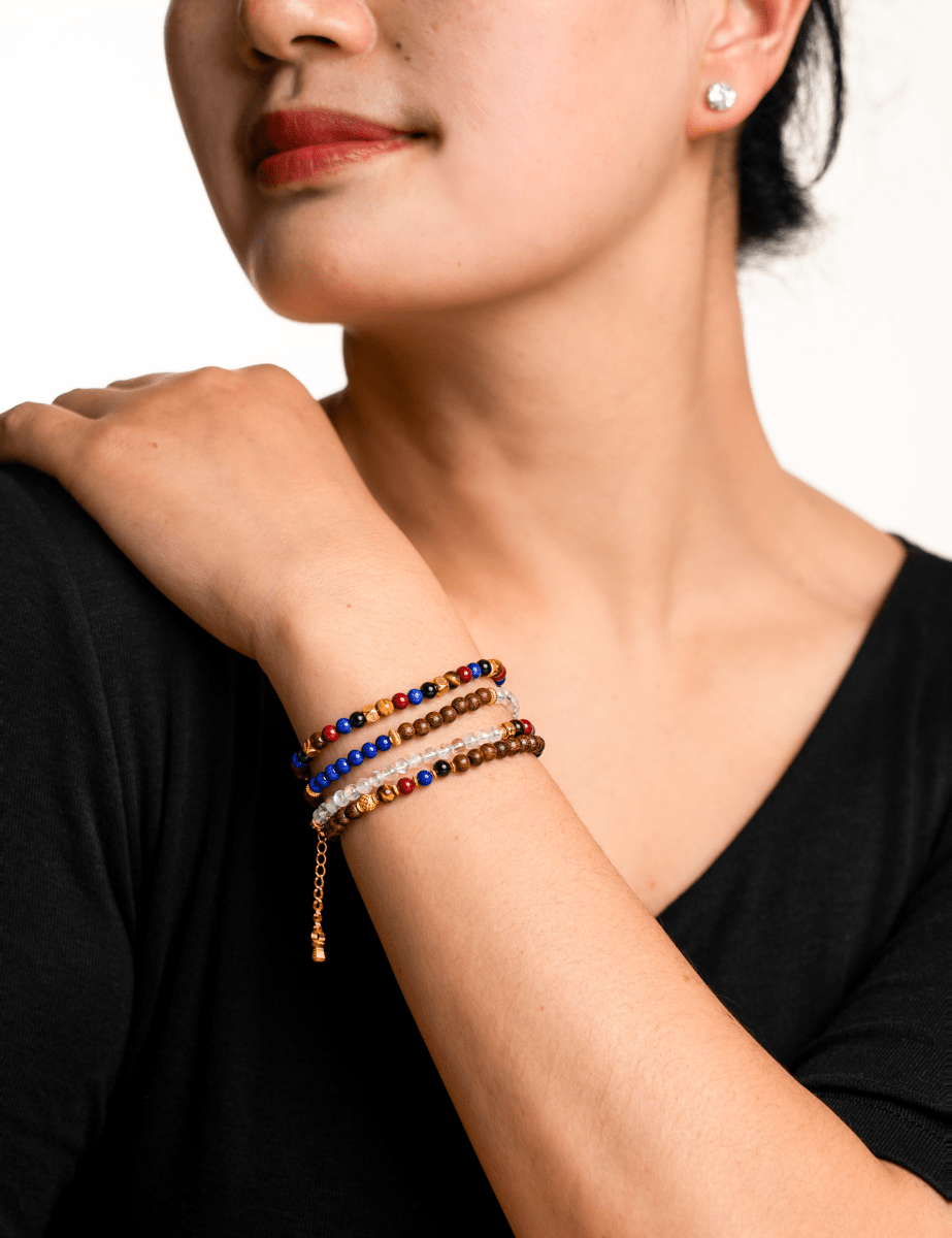 Model showcasing BEAMMORE Five Elements Solar Crest beaded bracelet with spacer beads on wrist – vibrant colors and unique design
