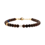 Five Elements Stellar Guardian Bracelet with black onyx, lapis lazuli, and sandalwood for elemental resonance.