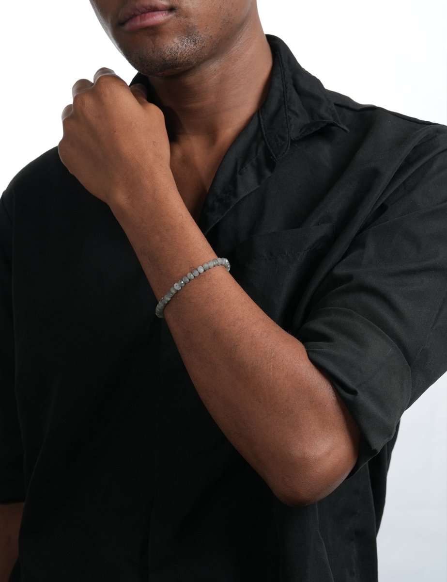 Model wearing BEAMMORE grey moonstone faceted 4×6mm bracelet – Clean, modern style