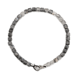 Growth Black Rutilated Quartz bracelet with 4x4mm beads and 925 sterling silver clasp, promoting resilience and clarity.