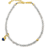 Growth Gray Moonstone bracelet with silver spacer bead and Lapis Lazuli charm showcasing elegance and emotional balance.