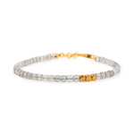Gray Moonstone faceted bracelet with silver spacer beads, symbolizing balance and intuition.