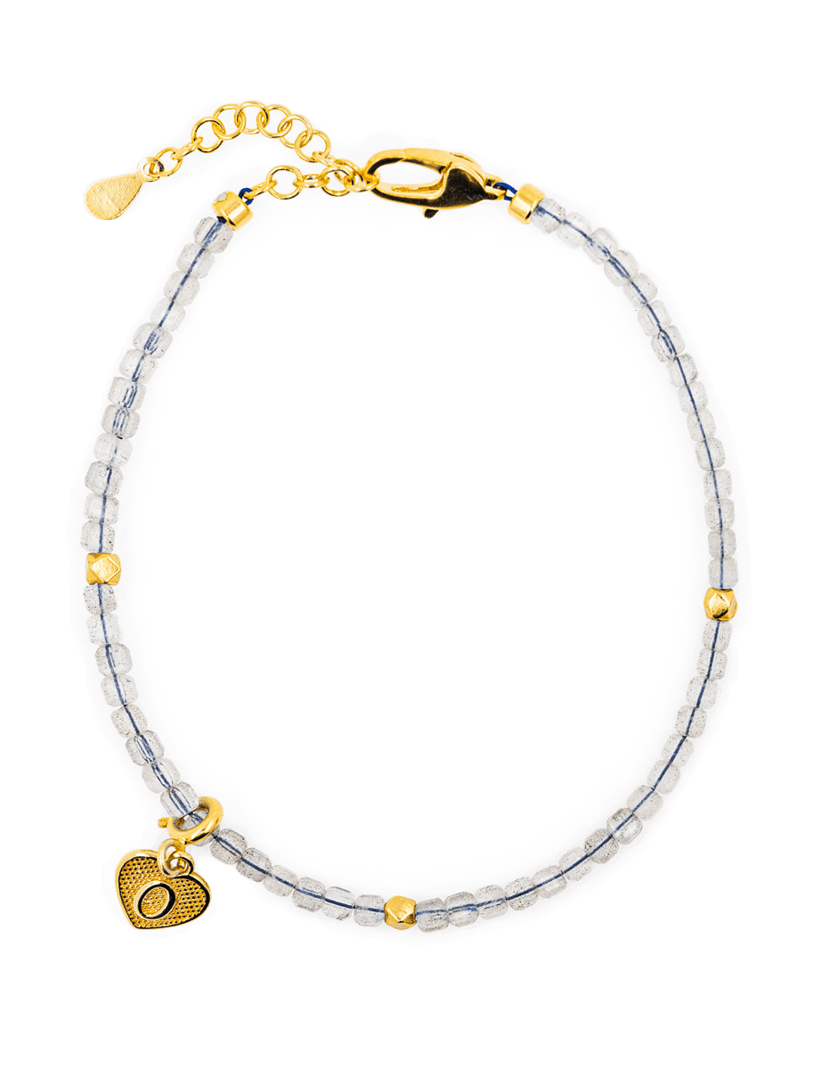 Gray Moonstone faceted bracelet with silver spacer beads and heart charm, symbolizing love and emotional balance.