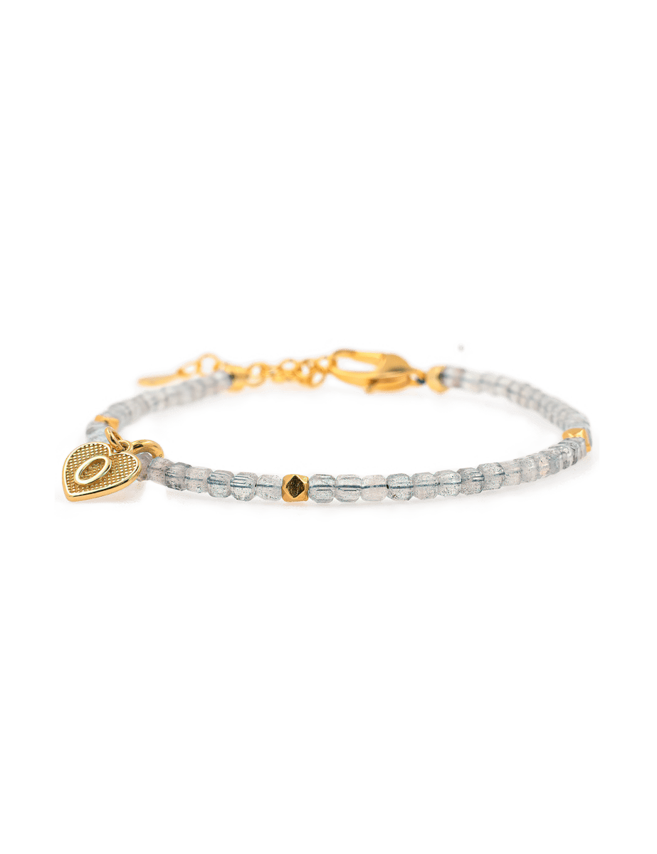 Gray Moonstone faceted bracelet with silver spacers and heart charm, symbolizing love and emotional growth.