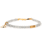 Gray Moonstone faceted bracelet with silver spacer beads and moon charm, ideal for intuition and balance.