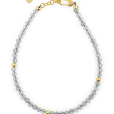 Gray Moonstone faceted dainty bracelet with gold spacer beads and adjustable clasp.
