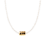 Harmony Moonstone dainty necklace featuring gold-plated nuggets and luminous moonstone beads on a delicate chain.