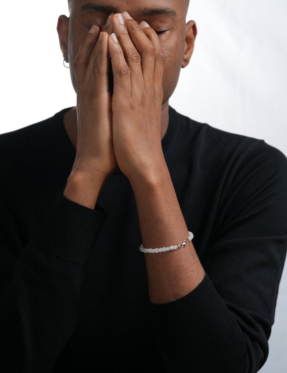 Model wearing BEAMMORE moonstone faceted 4×4mm bracelet – Clean, modern style