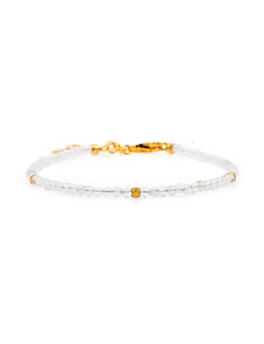 Healing Moonstone bracelet with 2mm silver spacer beads for emotional balance and personal growth.