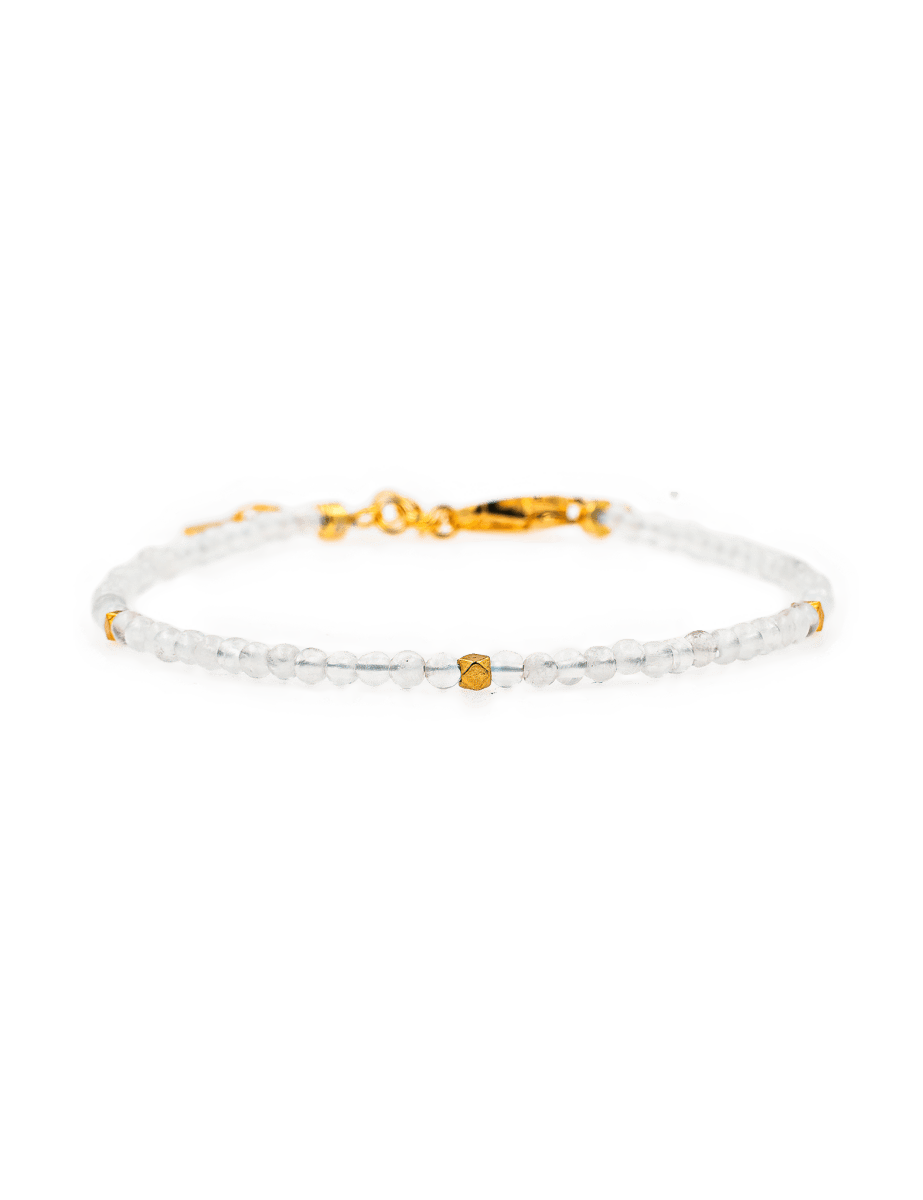 Healing Moonstone bracelet with 2mm silver spacer beads for emotional balance and personal growth.