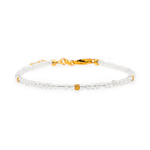 Healing Moonstone bracelet with 2mm silver spacer beads for emotional balance and personal growth.