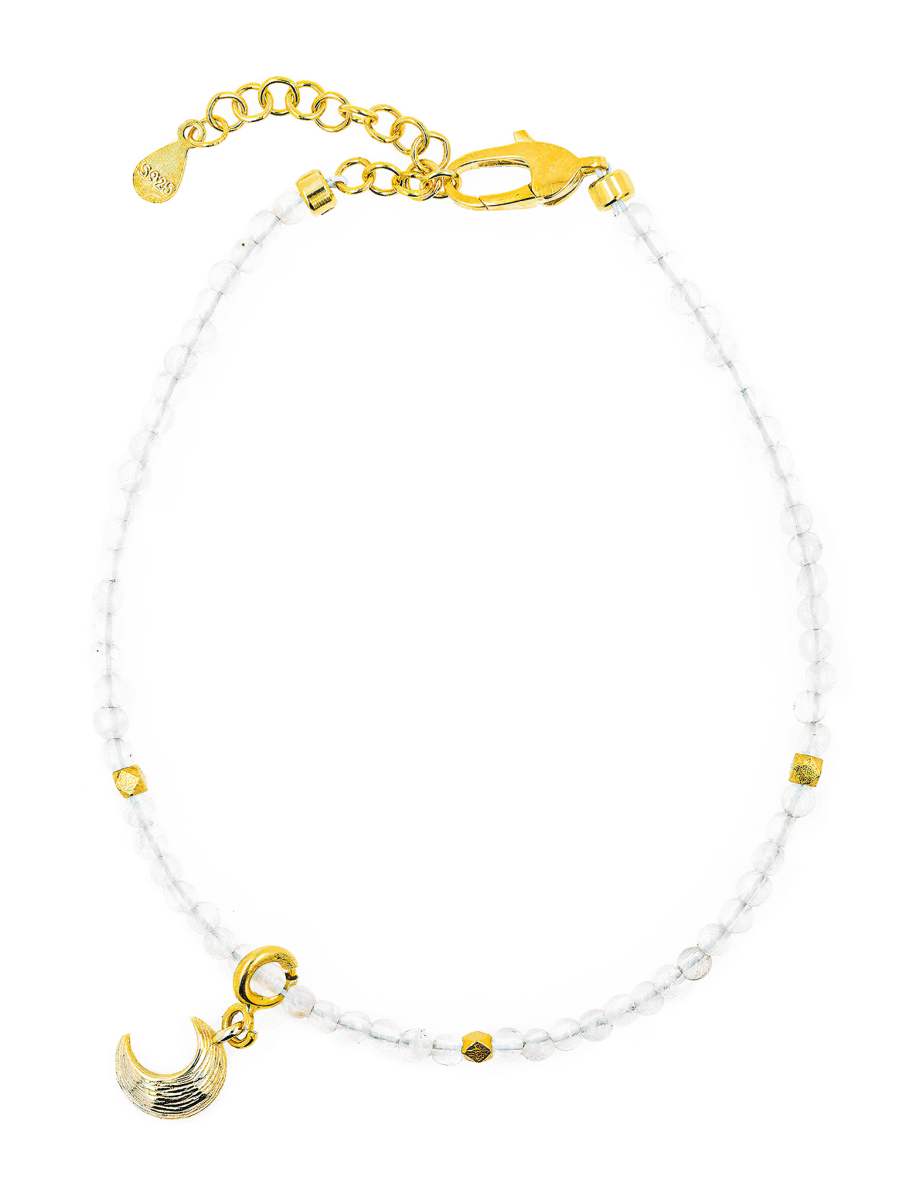 Healing Moonstone bracelet with gold moon charm and spacer beads for emotional renewal and intuition.