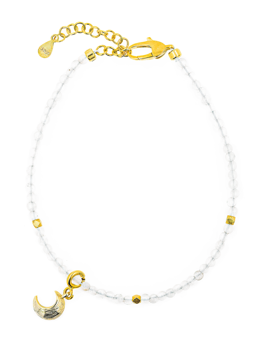 Healing Moonstone bracelet with gold moon charm and spacer beads for emotional renewal and intuition.