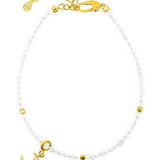 Healing Moonstone bracelet with gold moon charm and spacer beads for emotional renewal and intuition.