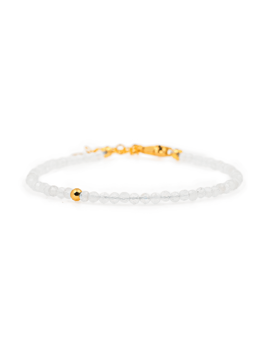 Dainty Moonstone bracelet with silver spacer beads, symbolizing emotional healing and inner balance.