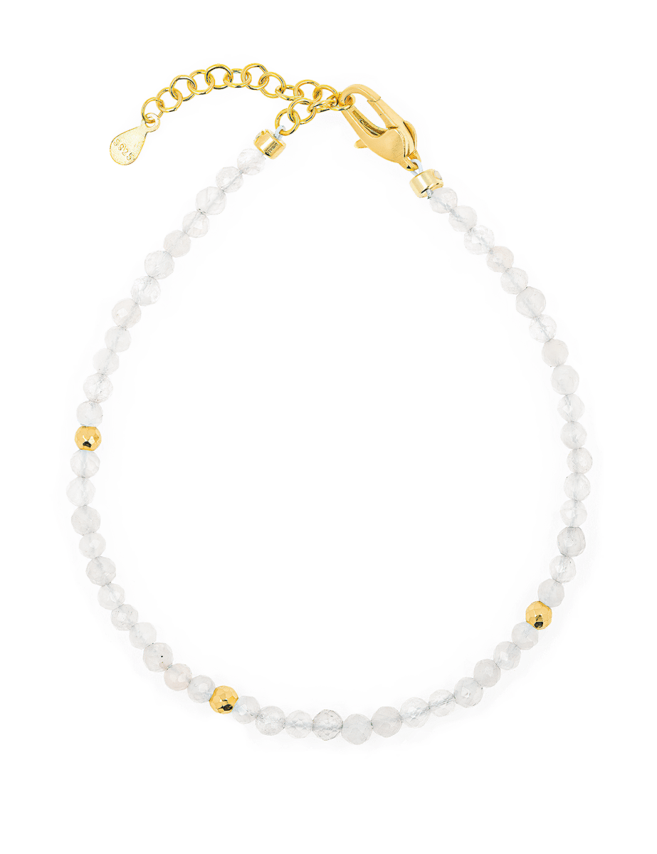 Healing Moonstone bracelet with silver spacer beads, showcasing a delicate design for emotional balance.