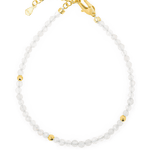 Healing Moonstone bracelet with silver spacer beads, showcasing a delicate design for emotional balance.