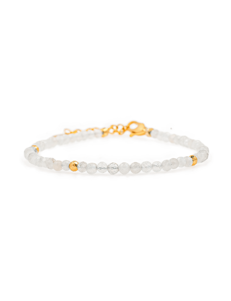 Healing Moonstone dainty bracelet with gold spacer beads, promoting emotional healing and personal growth.
