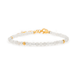Healing Moonstone dainty bracelet with gold spacer beads, promoting emotional healing and personal growth.