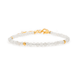 Healing Moonstone dainty bracelet with gold spacer beads, promoting emotional healing and personal growth.