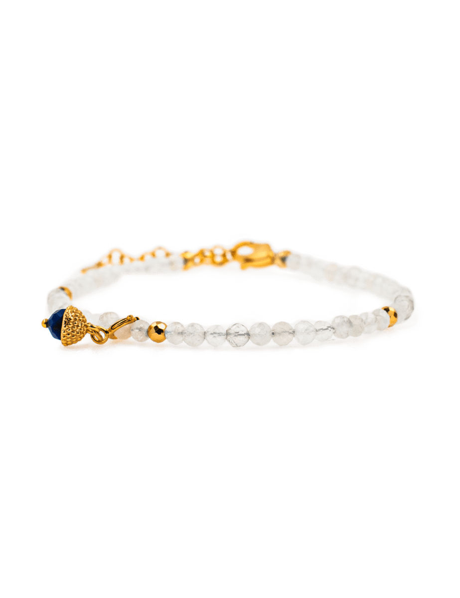 Healing Moonstone bracelet with silver spacer, Lapis Lazuli charm for emotional healing and inner peace.