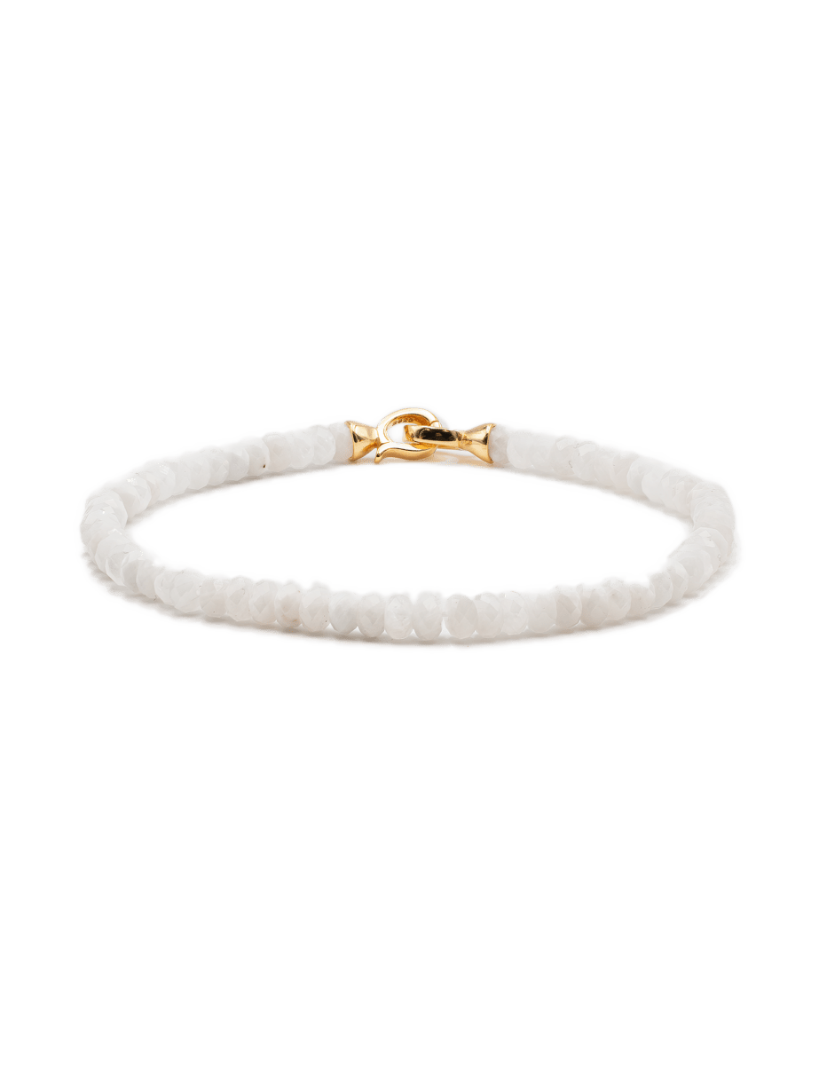 Moonstone bracelet with gold clasp, promoting healing and emotional balance for June birthdays.
