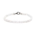 Moonstone June birthstone bracelet with faceted beads and sterling silver clasp, promoting healing and emotional balance.